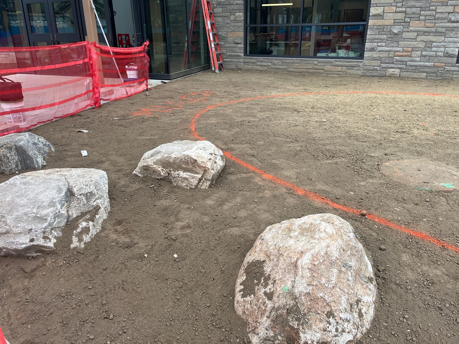 Central Middle School entrance area during construction before the Friday sod installation
