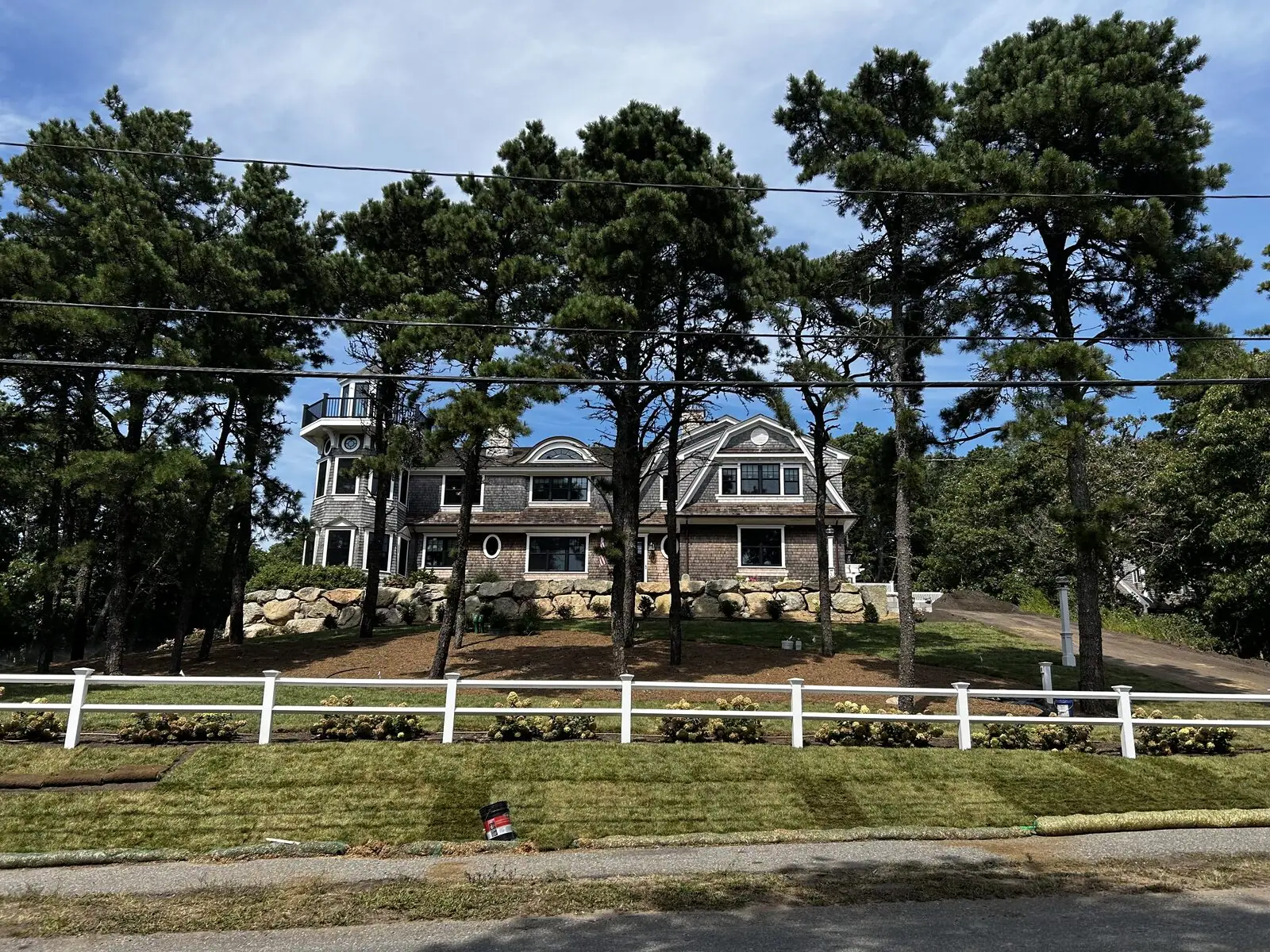 Finished sod lawn on a Massachusetts property inside the state's 100-foot wetlands buffer zone rules.