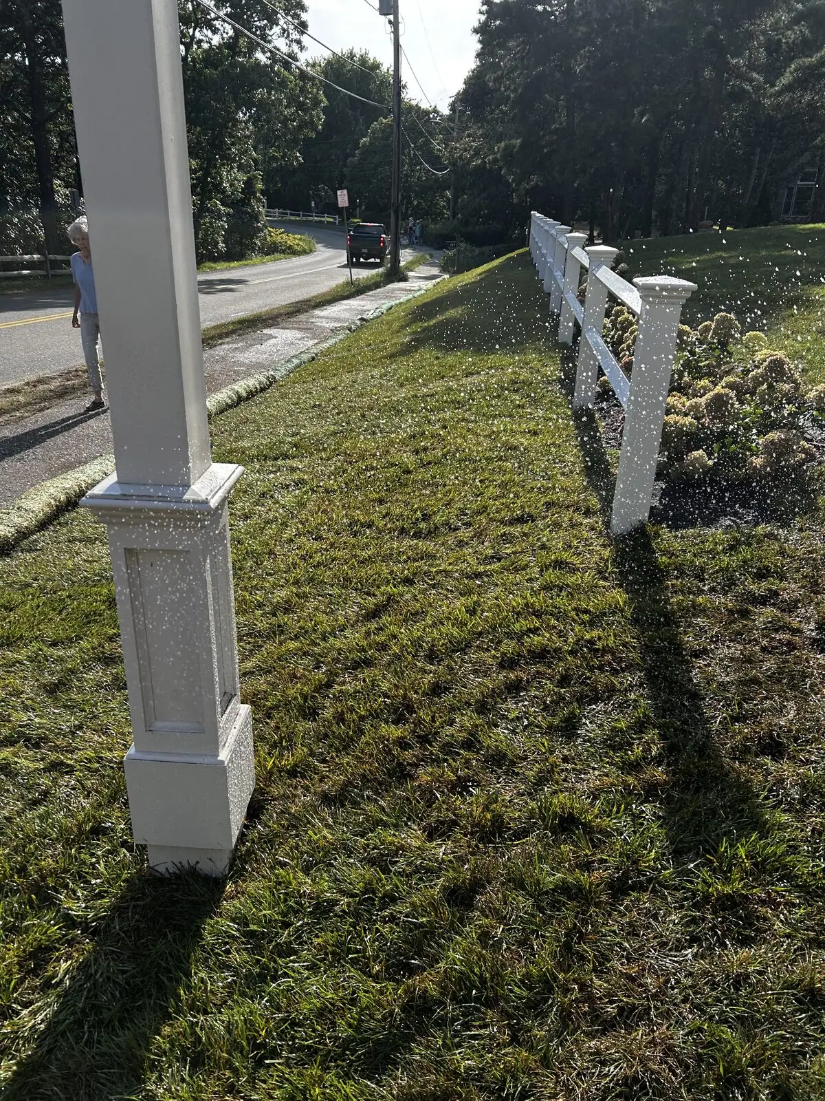 Sprinklers running over new sod at a Chatham, Massachusetts estate