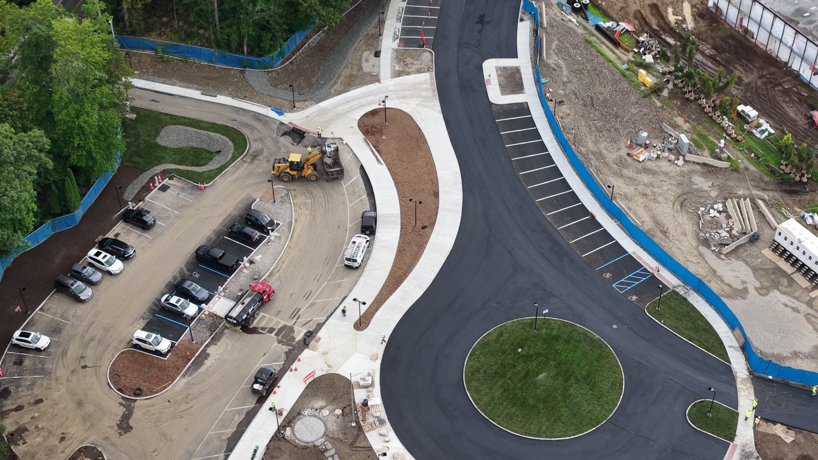 Friday afternoon aerial following the curved entrance drive and walkways through the active school site as CT Sod completed the designated lawn zones