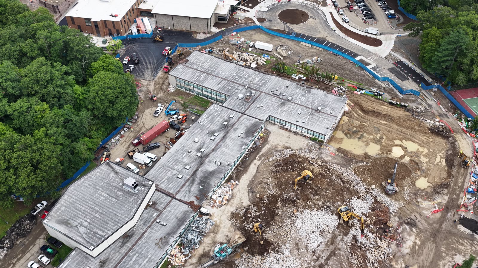 Friday morning campus flyover showing active construction and open grade before CT Sod began its approximately 11,000-square-foot sod scope
