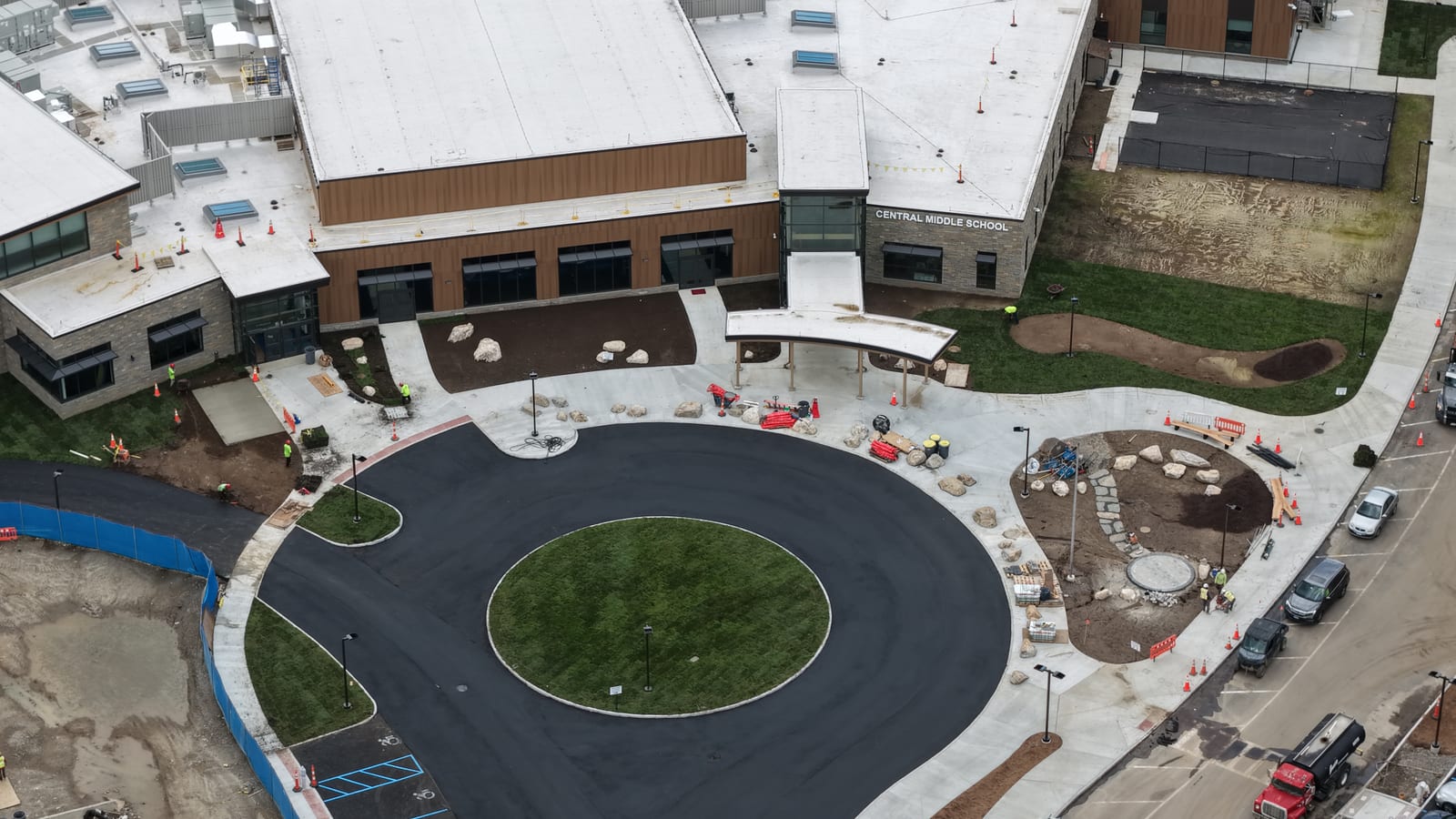 Finished-school flyover following the new sod along Central Middle School's entrance, curved sidewalks, and main circle. The video documents CT Sod's completed commercial turf-installation scope