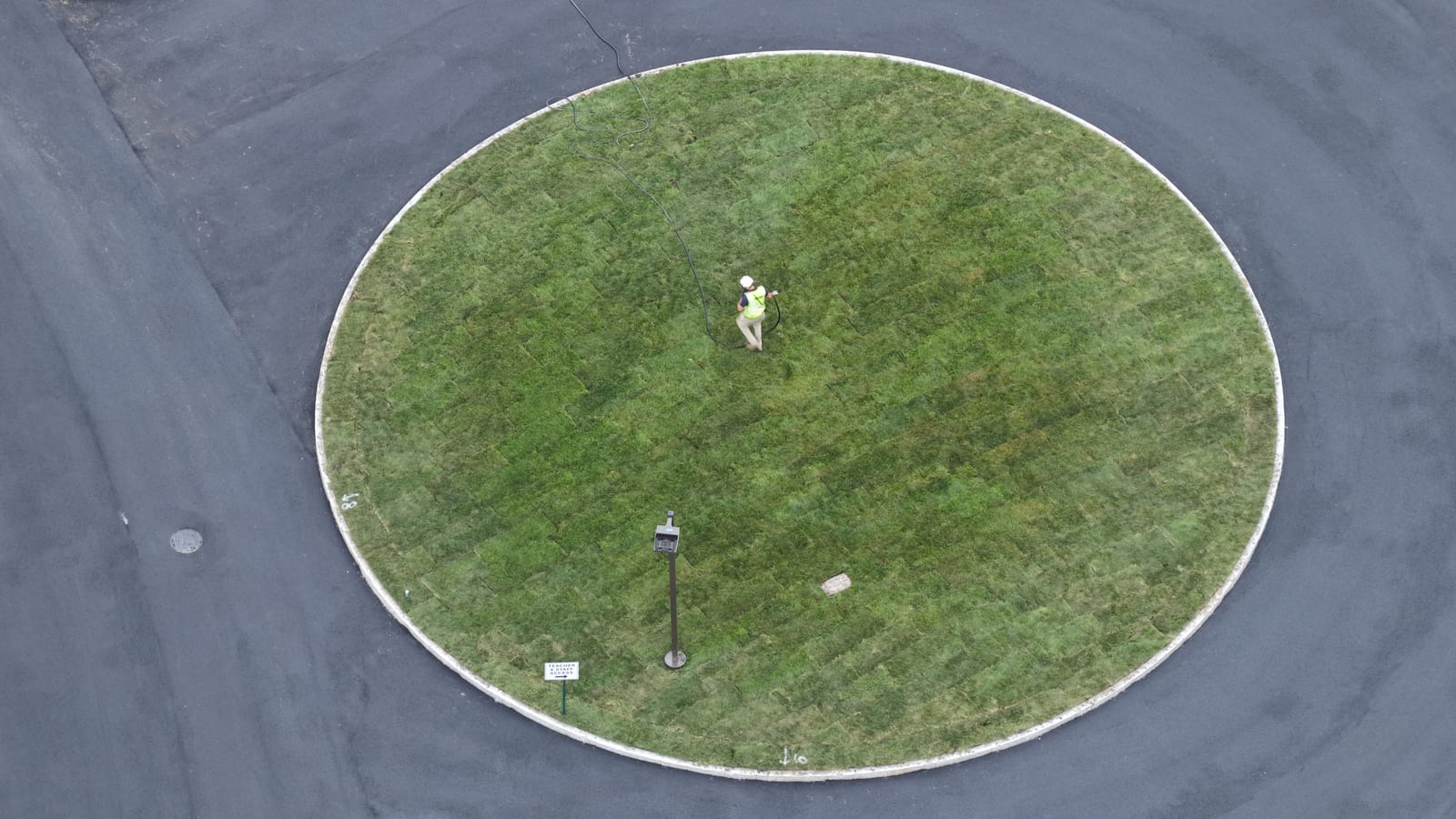 Friday afternoon drone clip showing newly installed sod and watering in the Central Middle School entrance circle. This documents visible installation progress, not completion of the full approximately 11,000 square feet