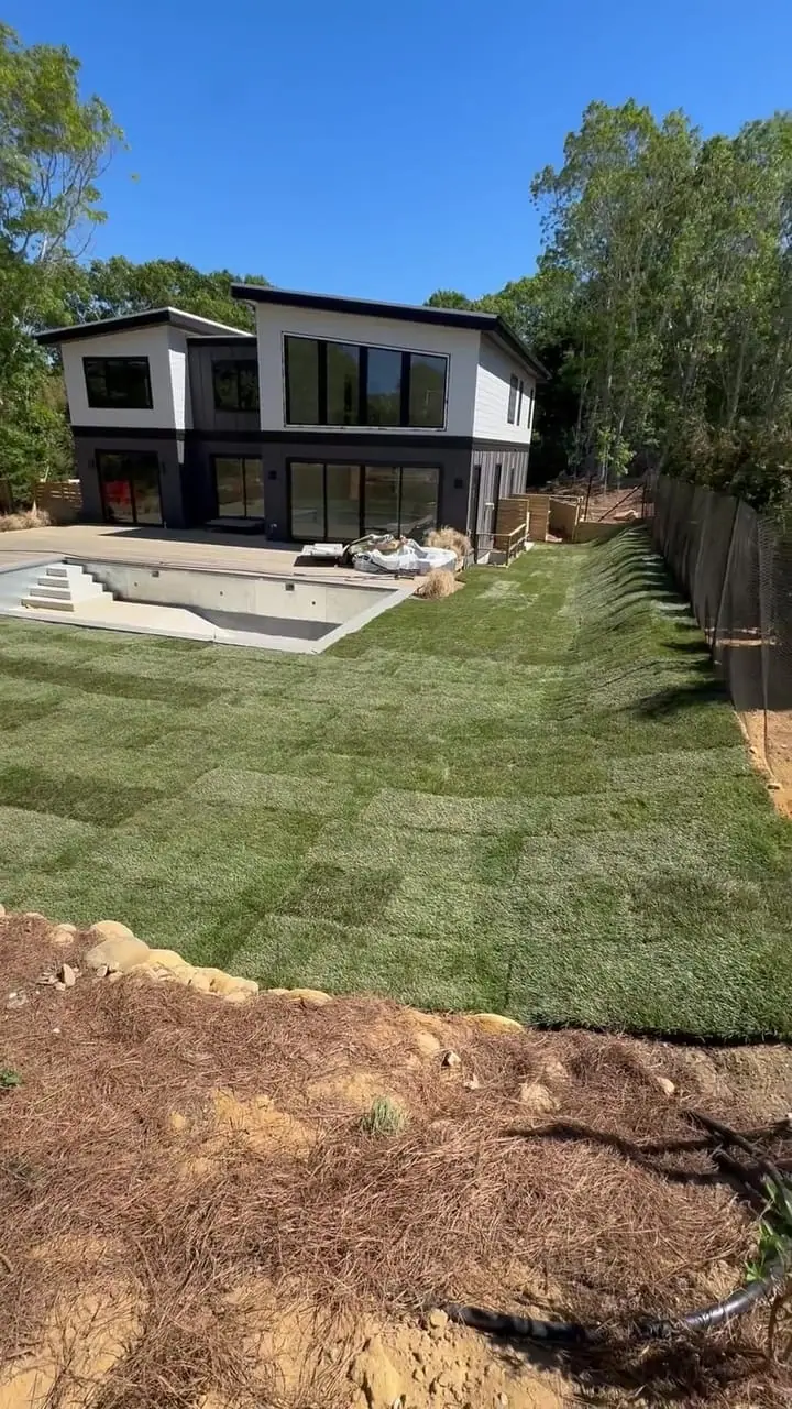 The finished 3,000 square foot fresh-cut sod lawn at the Montauk, NY property