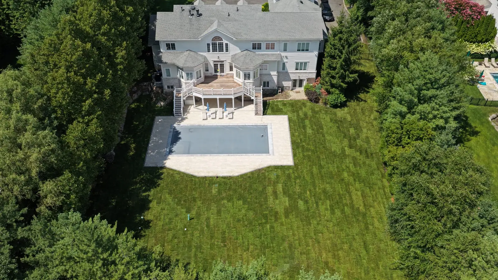 Finished 12,000 sq ft Kentucky Bluegrass sod lawn at an estate in Purchase, NY