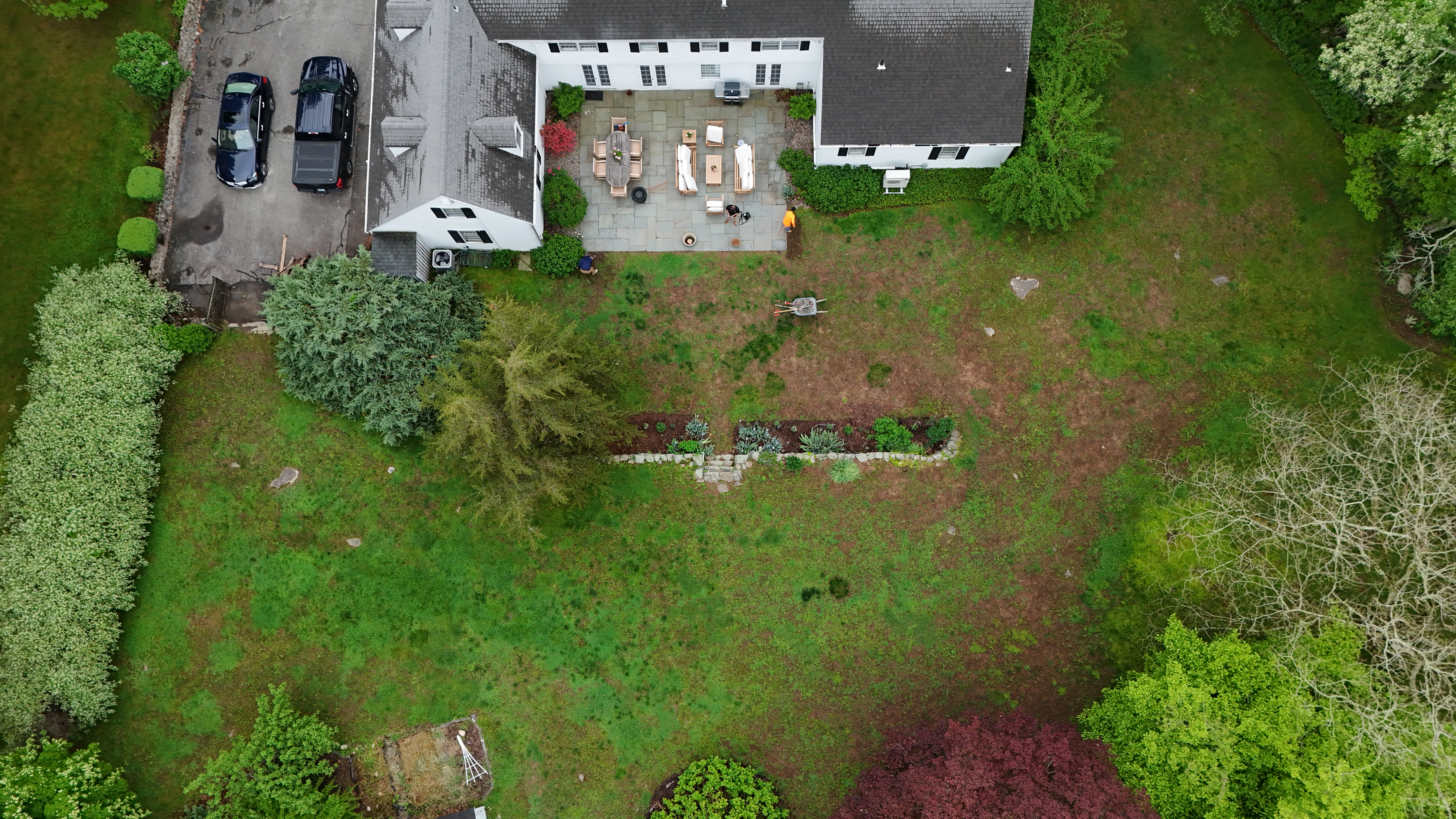 Aerial overview of the finished 6,000 sqft sod prep in Westbrook CT — full backyard staged and ready for sod