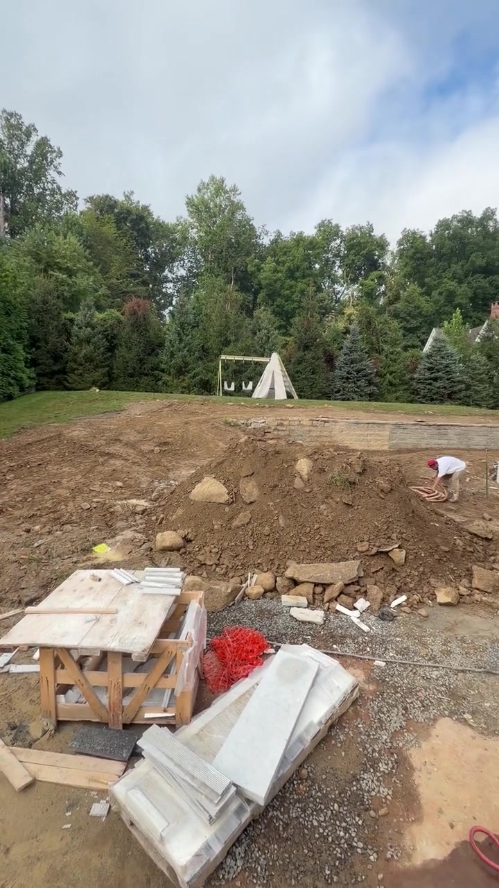 9 a.m. — rock and fill in the lower yard