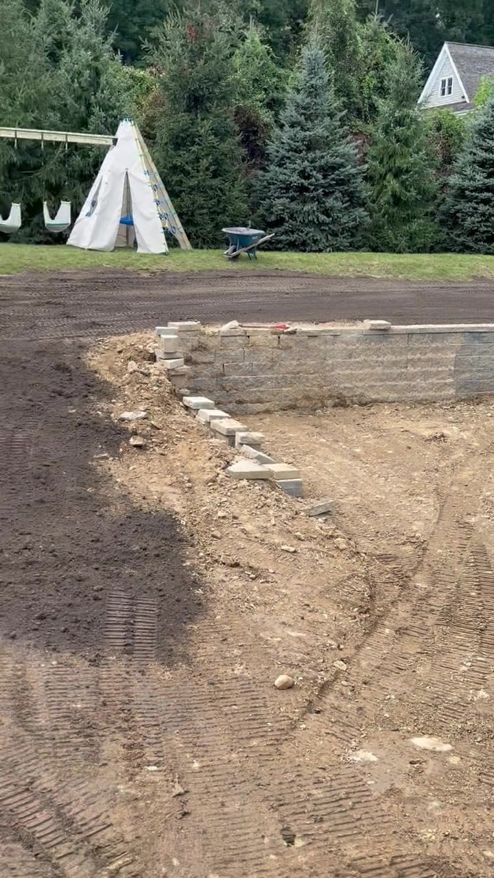 1:42 p.m. — topsoil across the upper lawn