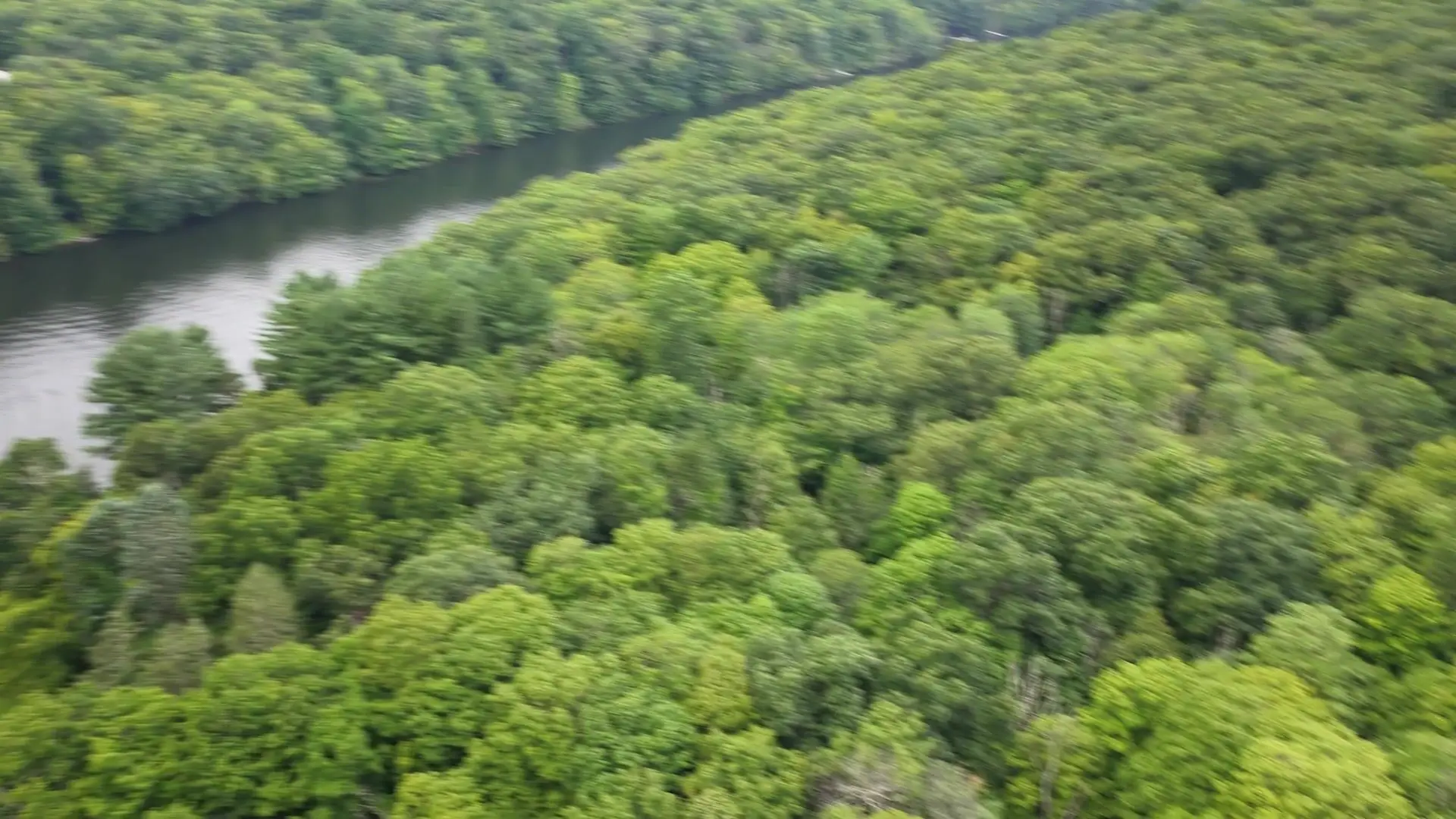 A wider customer-supplied drone flight from the Lake Lillinonah area toward the Bridgewater property and its new pond landscape