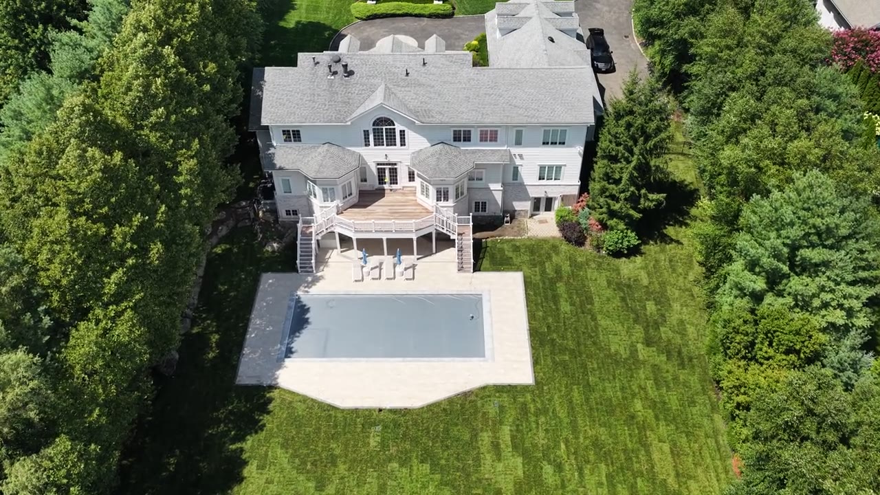 The full reveal — house, patio, pool, and 12,000 square feet of brand-new Kentucky bluegrass where the construction site used to be