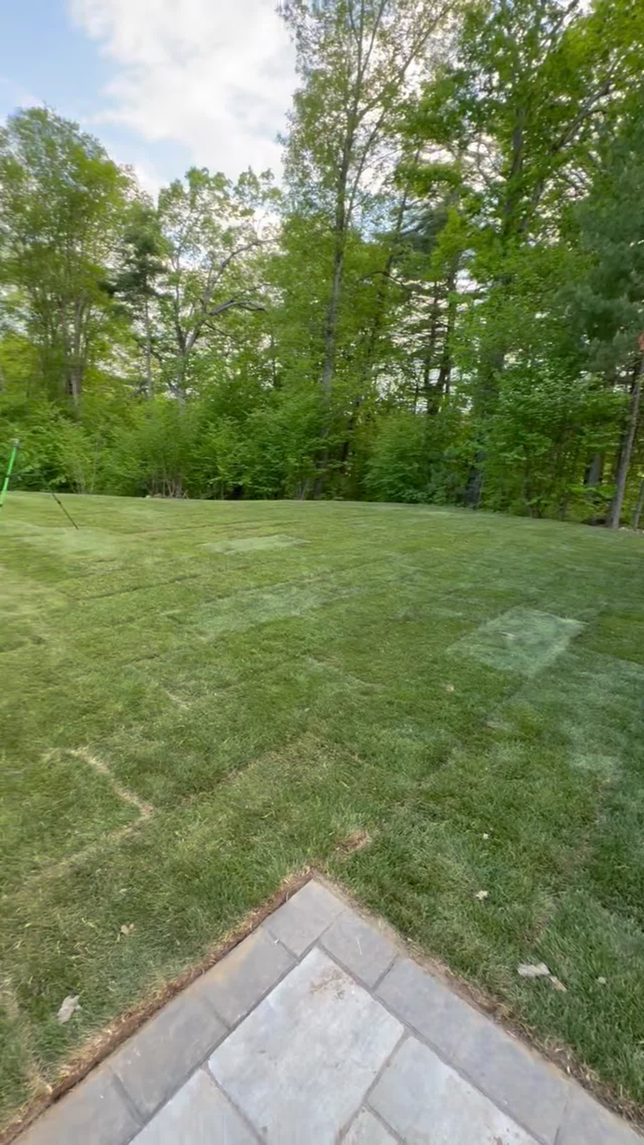 Finished install with sprinklers running on a Millbury, MA backyard