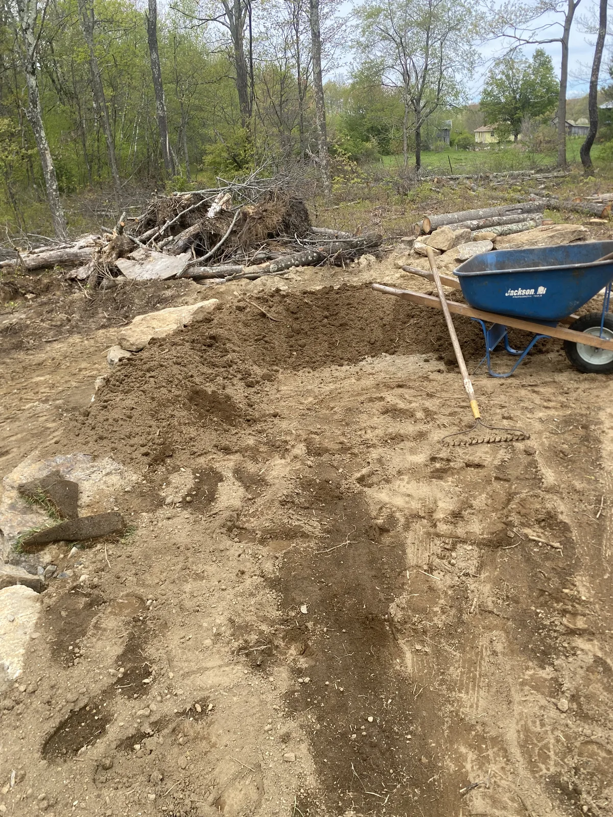 Warren CT sod install prep — final hand-grading and raking on a Lake Waramaug-area estate lot